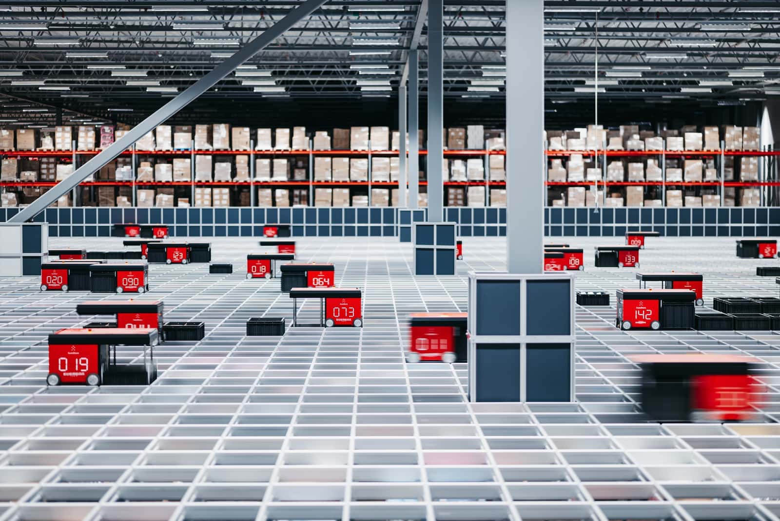 AutoStore robots in motion at a warehouse